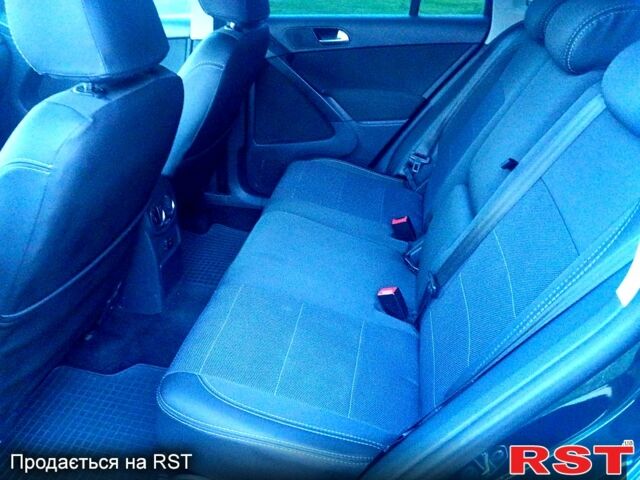 Зелений Фольксваген Тігуан, об'ємом двигуна 2 л та пробігом 280 тис. км за 13700 $, фото 2 на Automoto.ua