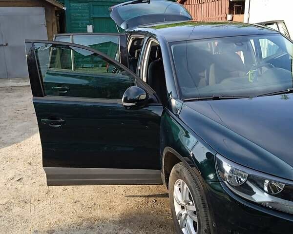 Зелений Фольксваген Тігуан, об'ємом двигуна 1.39 л та пробігом 170 тис. км за 12500 $, фото 6 на Automoto.ua