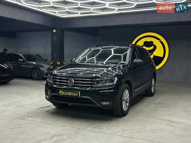 Зелений Фольксваген Тігуан, об'ємом двигуна 2 л та пробігом 96 тис. км за 19000 $, фото 2 на Automoto.ua