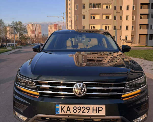 Зелений Фольксваген Тігуан, об'ємом двигуна 1.98 л та пробігом 102 тис. км за 20000 $, фото 7 на Automoto.ua