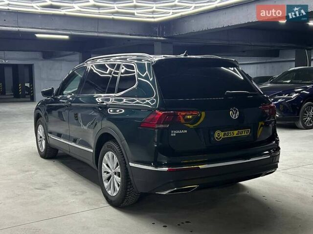 Зелений Фольксваген Тігуан, об'ємом двигуна 2 л та пробігом 96 тис. км за 19000 $, фото 3 на Automoto.ua