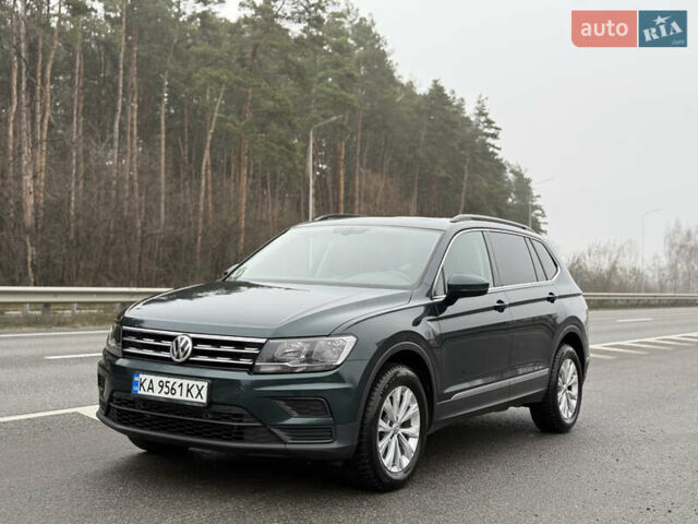 Зеленый Фольксваген Тигуан, объемом двигателя 1.98 л и пробегом 170 тыс. км за 18499 $, фото 1 на Automoto.ua