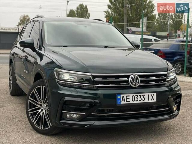 Зеленый Фольксваген Тигуан, объемом двигателя 1.98 л и пробегом 189 тыс. км за 17300 $, фото 1 на Automoto.ua