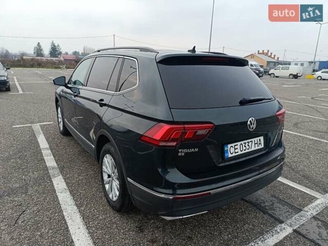 Зеленый Фольксваген Тигуан, объемом двигателя 2 л и пробегом 96 тыс. км за 19300 $, фото 3 на Automoto.ua