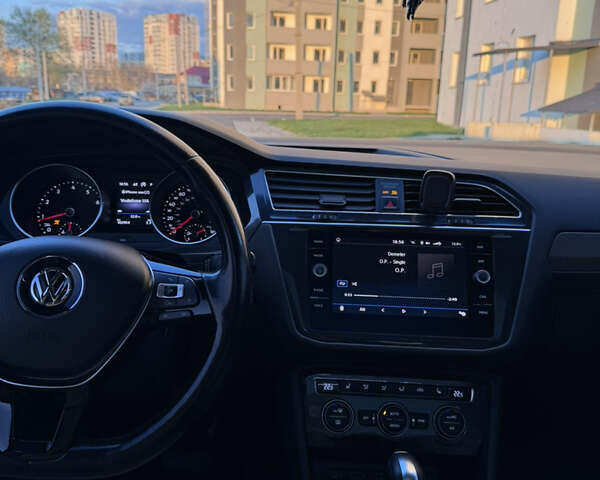 Зелений Фольксваген Тігуан, об'ємом двигуна 1.98 л та пробігом 102 тис. км за 20000 $, фото 14 на Automoto.ua