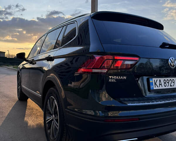 Зелений Фольксваген Тігуан, об'ємом двигуна 1.98 л та пробігом 102 тис. км за 20000 $, фото 36 на Automoto.ua