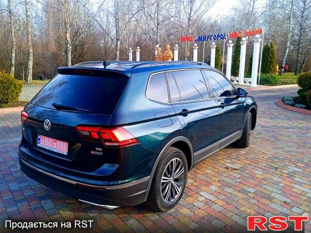 Зеленый Фольксваген Тигуан, объемом двигателя 2 л и пробегом 156 тыс. км за 16850 $, фото 5 на Automoto.ua