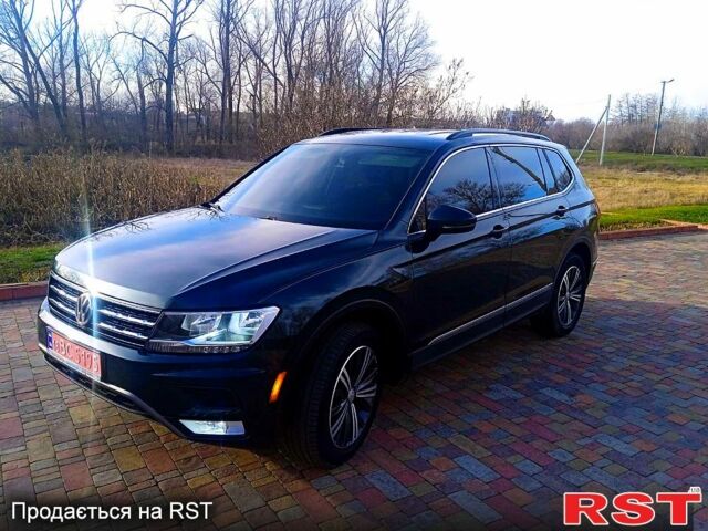 Зеленый Фольксваген Тигуан, объемом двигателя 2 л и пробегом 156 тыс. км за 16850 $, фото 2 на Automoto.ua