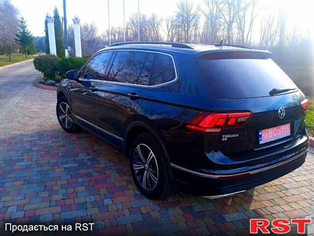 Зеленый Фольксваген Тигуан, объемом двигателя 2 л и пробегом 156 тыс. км за 16850 $, фото 1 на Automoto.ua