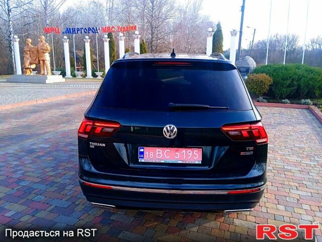 Зеленый Фольксваген Тигуан, объемом двигателя 2 л и пробегом 156 тыс. км за 16850 $, фото 3 на Automoto.ua