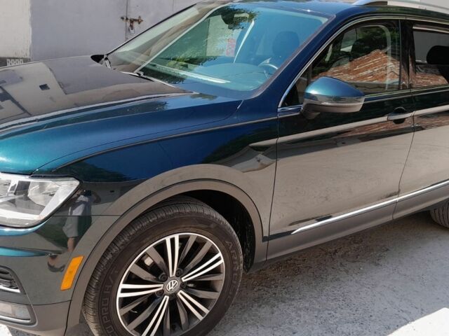 Зеленый Фольксваген Тигуан, объемом двигателя 2 л и пробегом 124 тыс. км за 21200 $, фото 2 на Automoto.ua