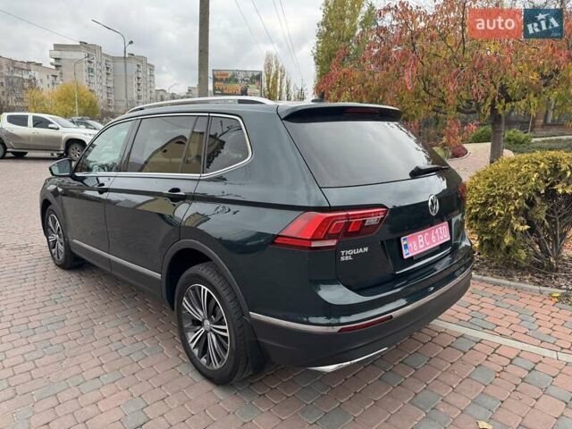 Зеленый Фольксваген Тигуан, объемом двигателя 1.98 л и пробегом 101 тыс. км за 16999 $, фото 1 на Automoto.ua