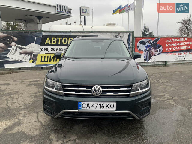 Зеленый Фольксваген Тигуан, объемом двигателя 1.98 л и пробегом 161 тыс. км за 21200 $, фото 19 на Automoto.ua