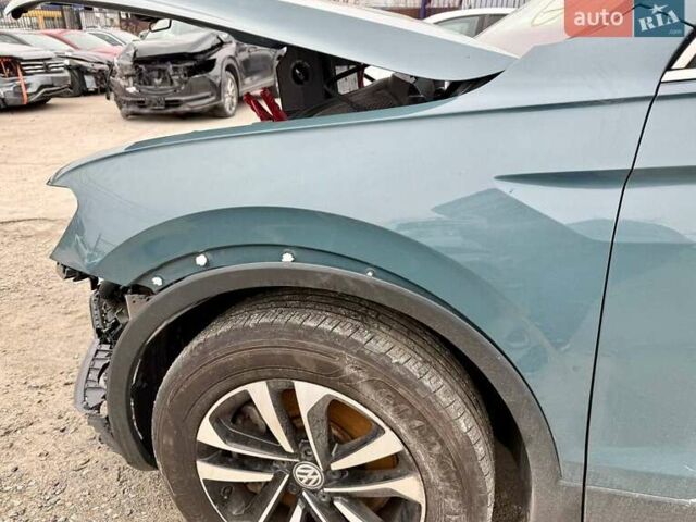 Зеленый Фольксваген Тигуан, объемом двигателя 2 л и пробегом 80 тыс. км за 13000 $, фото 23 на Automoto.ua