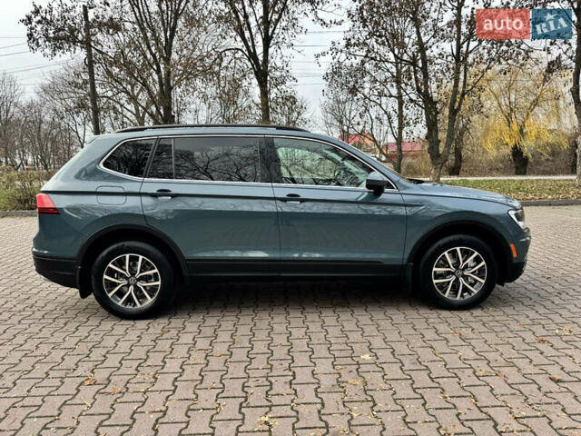 Зелений Фольксваген Тігуан, об'ємом двигуна 1.98 л та пробігом 80 тис. км за 21700 $, фото 6 на Automoto.ua