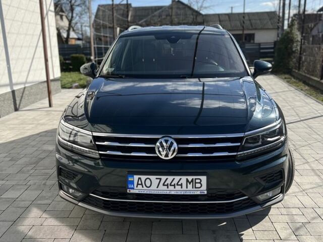 Зеленый Фольксваген Тигуан, объемом двигателя 2 л и пробегом 208 тыс. км за 30900 $, фото 2 на Automoto.ua