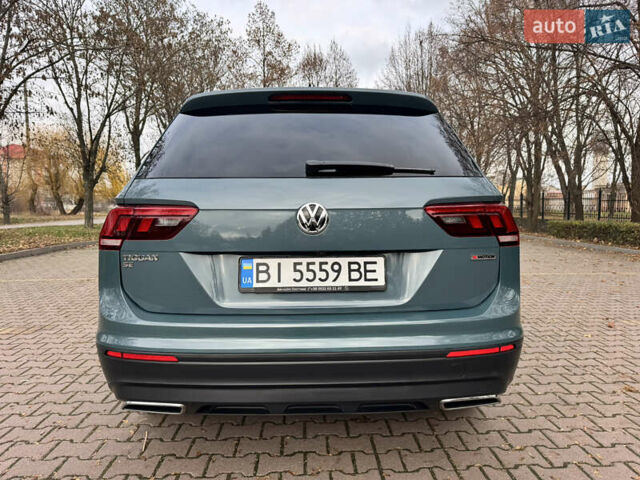 Зелений Фольксваген Тігуан, об'ємом двигуна 1.98 л та пробігом 80 тис. км за 21700 $, фото 7 на Automoto.ua
