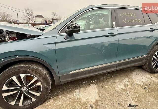 Зеленый Фольксваген Тигуан, объемом двигателя 2 л и пробегом 80 тыс. км за 13000 $, фото 21 на Automoto.ua