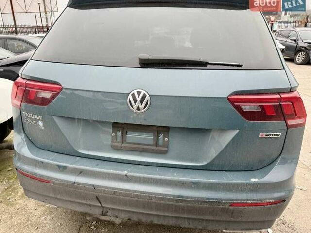 Зеленый Фольксваген Тигуан, объемом двигателя 2 л и пробегом 80 тыс. км за 13000 $, фото 20 на Automoto.ua