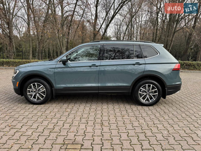 Зелений Фольксваген Тігуан, об'ємом двигуна 1.98 л та пробігом 80 тис. км за 21700 $, фото 3 на Automoto.ua