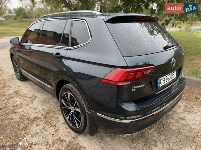 Зелений Фольксваген Тігуан, об'ємом двигуна 2 л та пробігом 170 тис. км за 19900 $, фото 4 на Automoto.ua