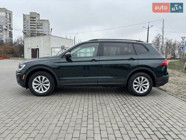 Зелений Фольксваген Тігуан, об'ємом двигуна 2 л та пробігом 160 тис. км за 16700 $, фото 2 на Automoto.ua