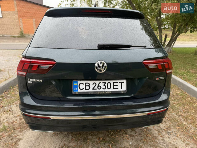 Зелений Фольксваген Тігуан, об'ємом двигуна 2 л та пробігом 170 тис. км за 19900 $, фото 8 на Automoto.ua