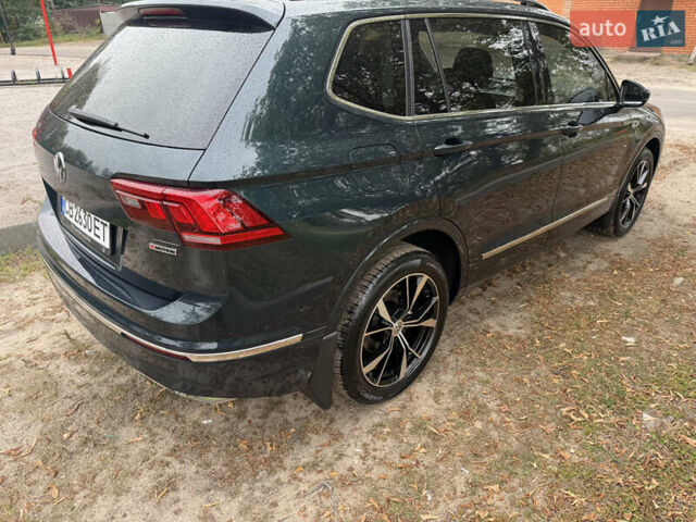 Зелений Фольксваген Тігуан, об'ємом двигуна 2 л та пробігом 170 тис. км за 19900 $, фото 9 на Automoto.ua