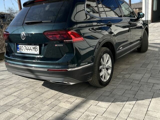 Зеленый Фольксваген Тигуан, объемом двигателя 2 л и пробегом 208 тыс. км за 30900 $, фото 3 на Automoto.ua