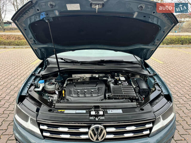 Зелений Фольксваген Тігуан, об'ємом двигуна 1.98 л та пробігом 80 тис. км за 21700 $, фото 19 на Automoto.ua