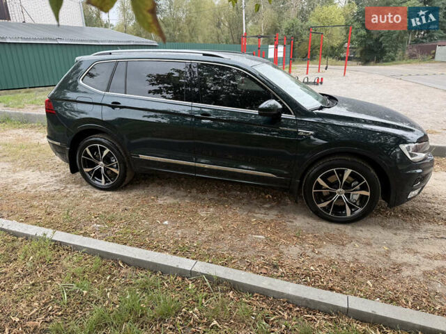 Зелений Фольксваген Тігуан, об'ємом двигуна 2 л та пробігом 170 тис. км за 19900 $, фото 34 на Automoto.ua