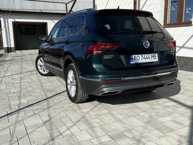 Зеленый Фольксваген Тигуан, объемом двигателя 2 л и пробегом 208 тыс. км за 30900 $, фото 4 на Automoto.ua