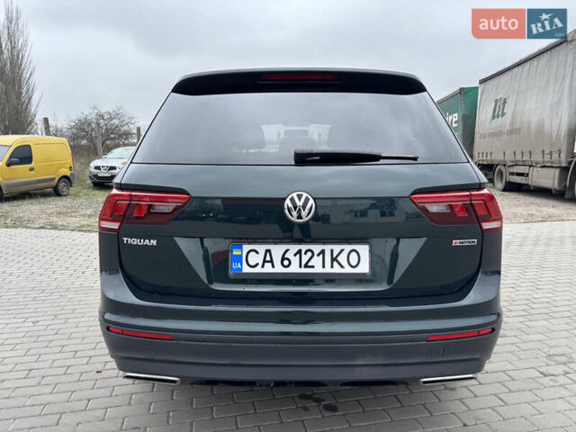 Зелений Фольксваген Тігуан, об'ємом двигуна 2 л та пробігом 160 тис. км за 16700 $, фото 4 на Automoto.ua