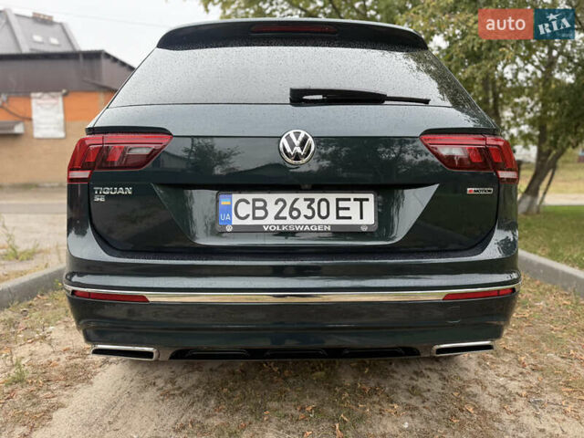 Зелений Фольксваген Тігуан, об'ємом двигуна 2 л та пробігом 170 тис. км за 19900 $, фото 6 на Automoto.ua