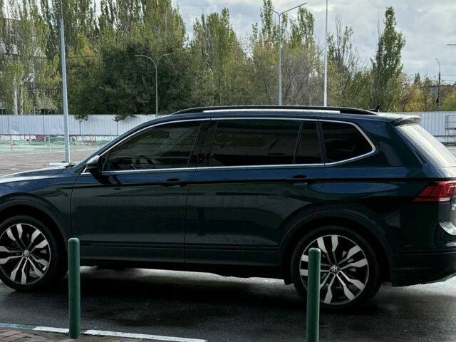 Зеленый Фольксваген Тигуан, объемом двигателя 2 л и пробегом 50 тыс. км за 26800 $, фото 3 на Automoto.ua