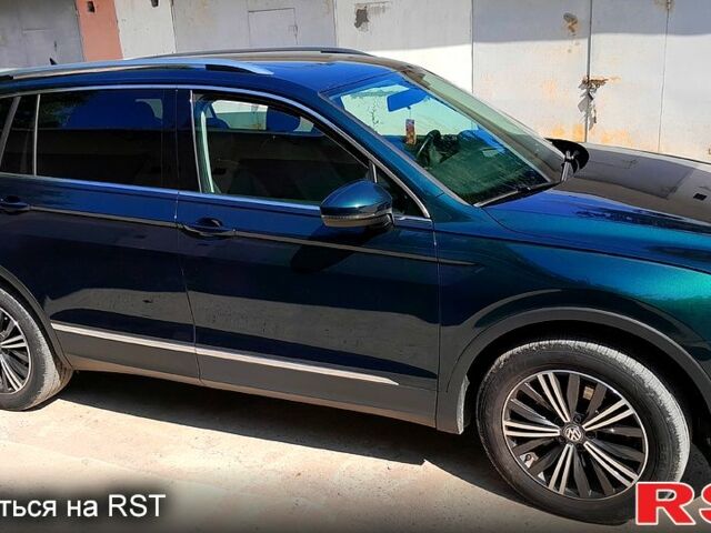 Зеленый Фольксваген Тигуан, объемом двигателя 2 л и пробегом 123 тыс. км за 21800 $, фото 1 на Automoto.ua