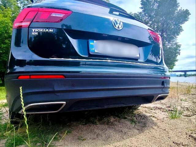 Зеленый Фольксваген Тигуан, объемом двигателя 2 л и пробегом 96 тыс. км за 21300 $, фото 2 на Automoto.ua