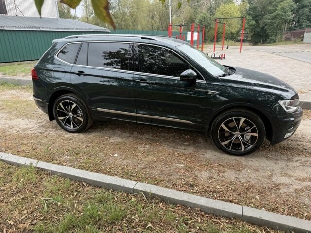 Зелений Фольксваген Тігуан, об'ємом двигуна 2 л та пробігом 106 тис. км за 19900 $, фото 6 на Automoto.ua