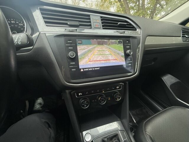 Зелений Фольксваген Тігуан, об'ємом двигуна 2 л та пробігом 106 тис. км за 19900 $, фото 2 на Automoto.ua