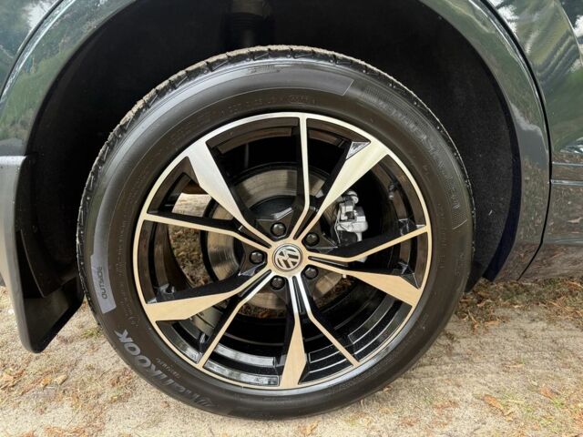 Зелений Фольксваген Тігуан, об'ємом двигуна 2 л та пробігом 106 тис. км за 19900 $, фото 1 на Automoto.ua