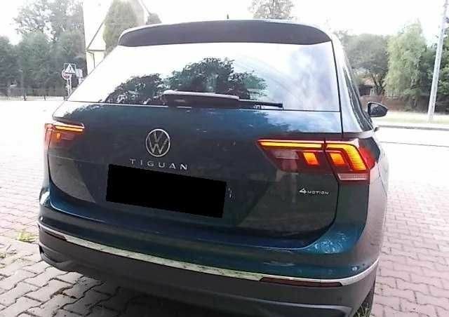 Зеленый Фольксваген Тигуан, объемом двигателя 2 л и пробегом 54 тыс. км за 11200 $, фото 5 на Automoto.ua