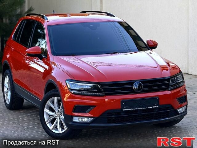 Оранжевый Фольксваген Тигуан, объемом двигателя 2 л и пробегом 160 тыс. км за 23700 $, фото 1 на Automoto.ua