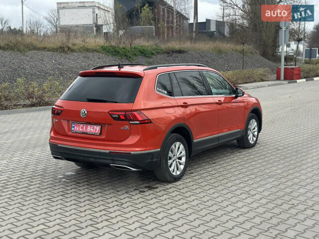 Оранжевый Фольксваген Тигуан, объемом двигателя 2 л и пробегом 143 тыс. км за 16700 $, фото 6 на Automoto.ua