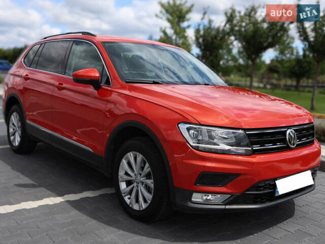 Помаранчевий Фольксваген Тігуан, об'ємом двигуна 2 л та пробігом 146 тис. км за 21000 $, фото 2 на Automoto.ua