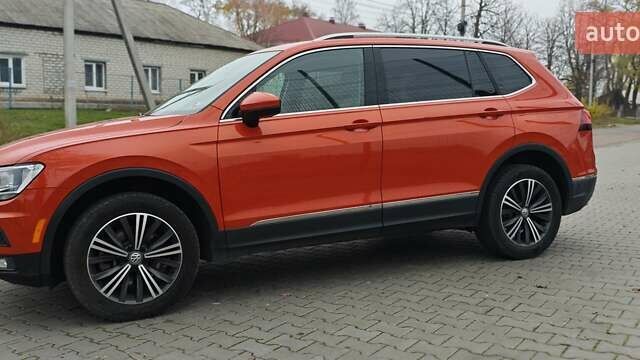 Оранжевый Фольксваген Тигуан, объемом двигателя 1.98 л и пробегом 148 тыс. км за 16200 $, фото 3 на Automoto.ua
