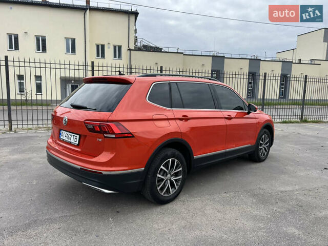 Помаранчевий Фольксваген Тігуан, об'ємом двигуна 1.98 л та пробігом 58 тис. км за 18900 $, фото 1 на Automoto.ua