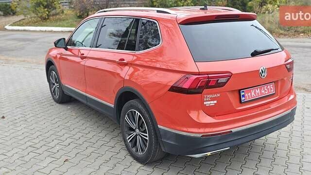 Оранжевый Фольксваген Тигуан, объемом двигателя 1.98 л и пробегом 148 тыс. км за 16200 $, фото 20 на Automoto.ua