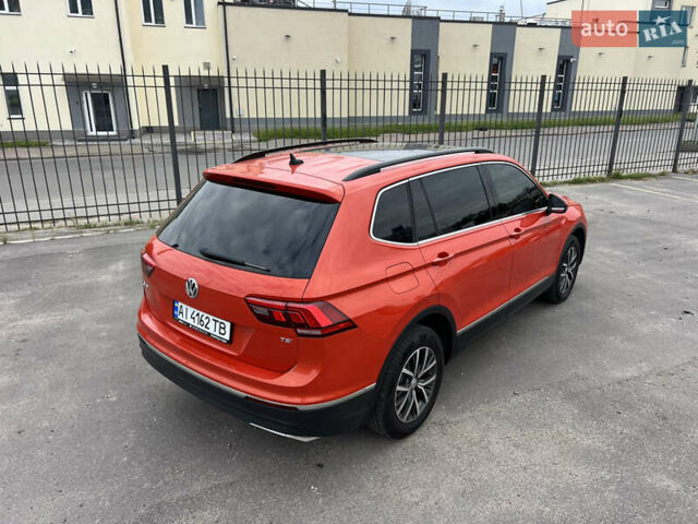 Помаранчевий Фольксваген Тігуан, об'ємом двигуна 1.98 л та пробігом 58 тис. км за 18900 $, фото 6 на Automoto.ua