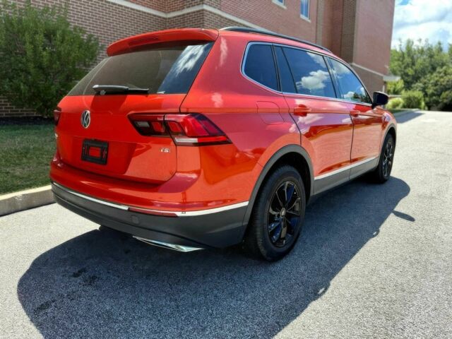 Помаранчевий Фольксваген Тігуан, об'ємом двигуна 2 л та пробігом 31 тис. км за 9000 $, фото 6 на Automoto.ua