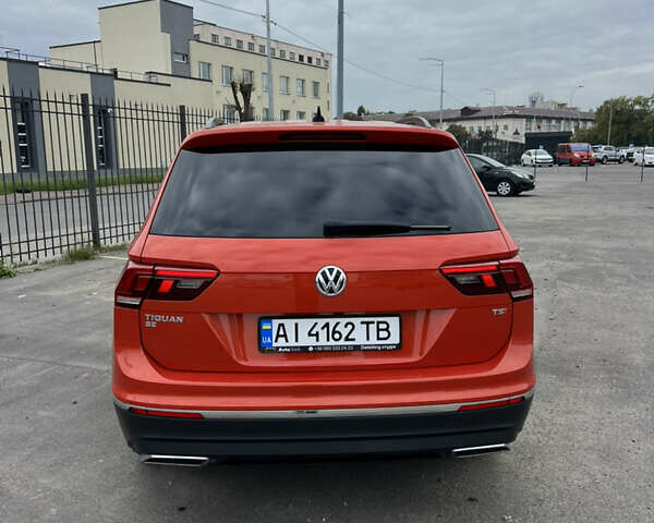 Помаранчевий Фольксваген Тігуан, об'ємом двигуна 1.98 л та пробігом 58 тис. км за 18900 $, фото 9 на Automoto.ua